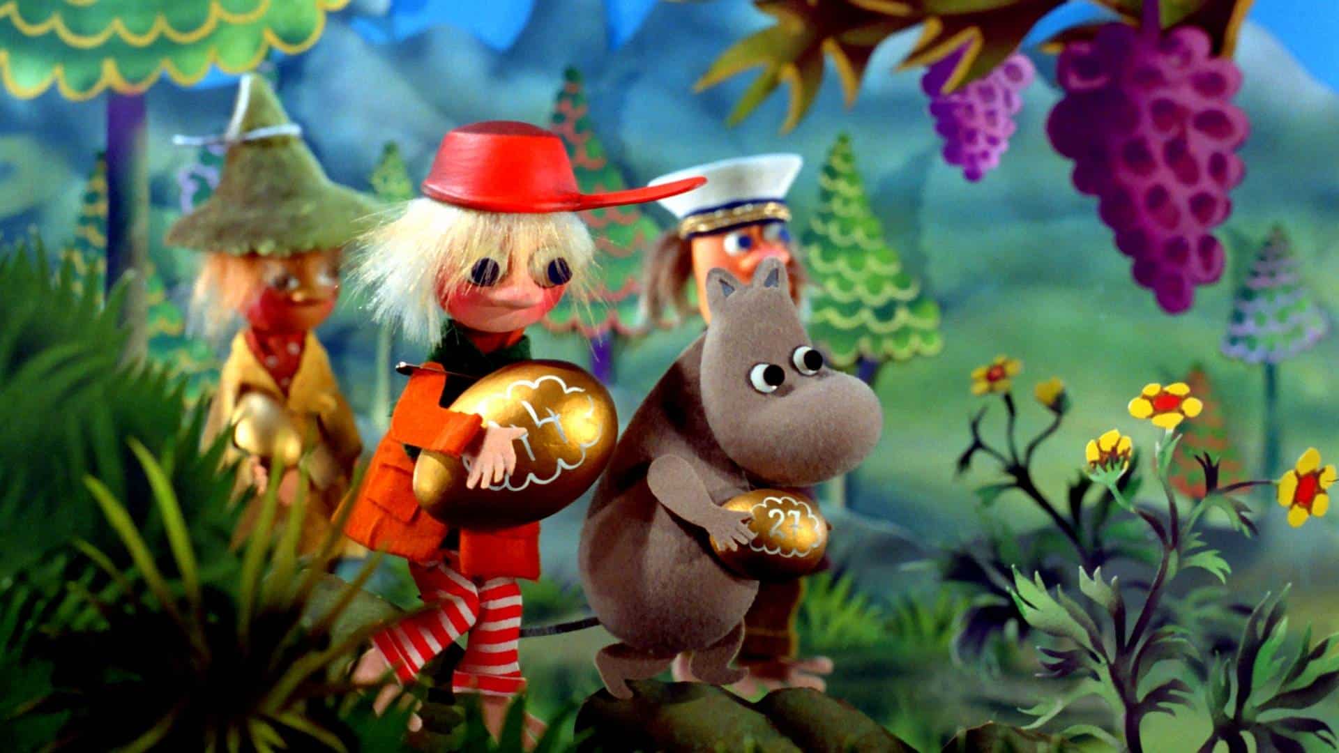 Bilete frå animasjonsfilm. Ein faun held eit anna vesen i handa, månen i bakgrunnet. Blå, grønt lys